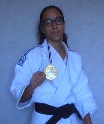 Lucie médaillée d'or.